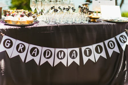 Graduation table decor - AdobeStock_249129014