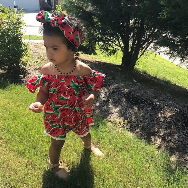 toddler in watermelon onesie