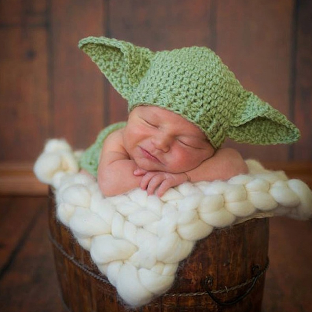 baby in baby yoda hat