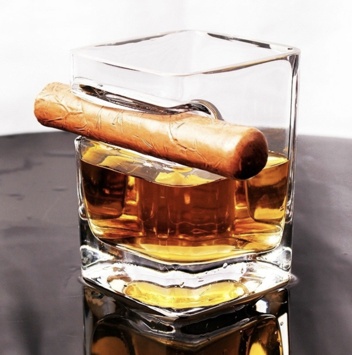 whiskey glass with cigar indentation rest