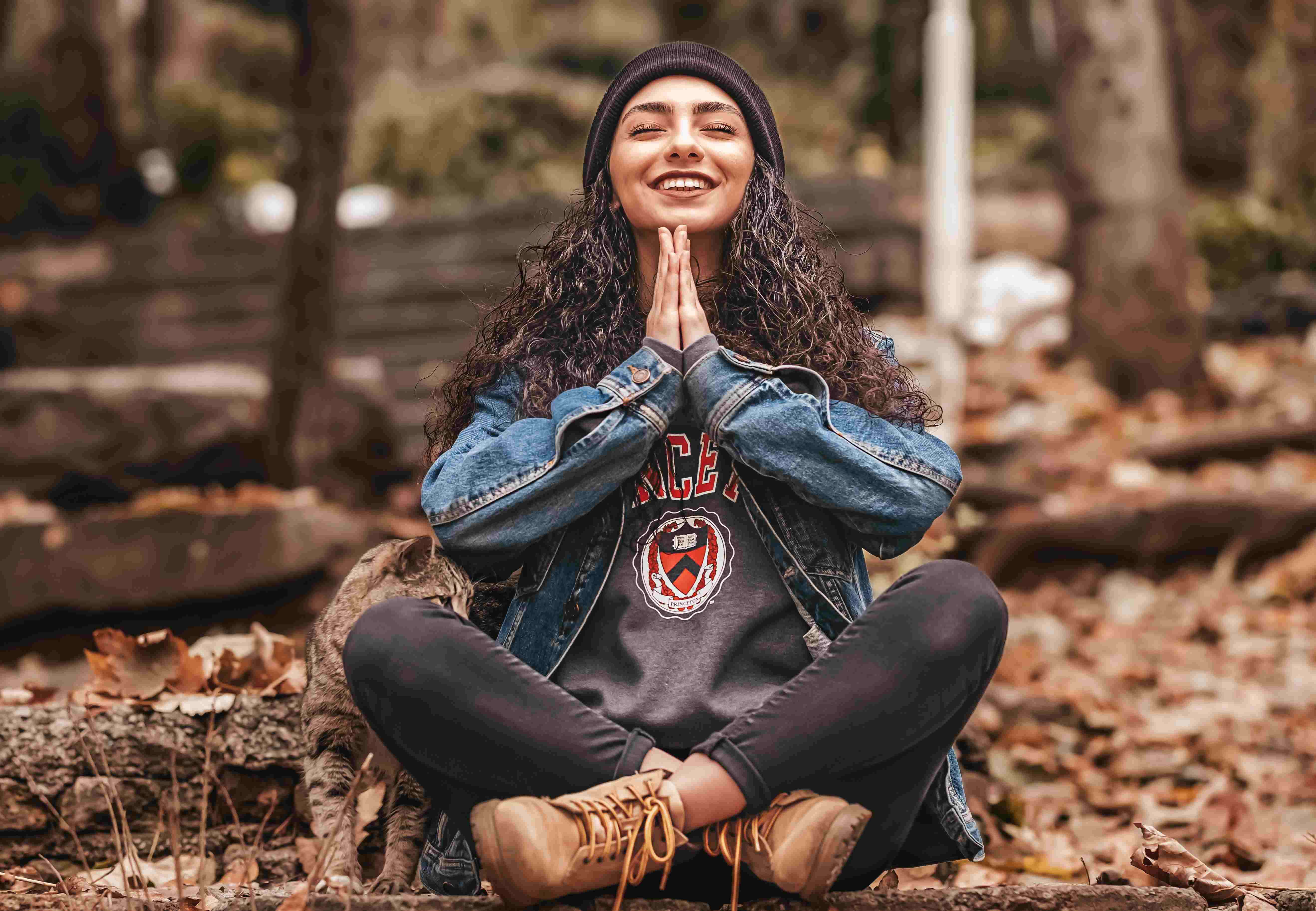 woman meditating in the woods