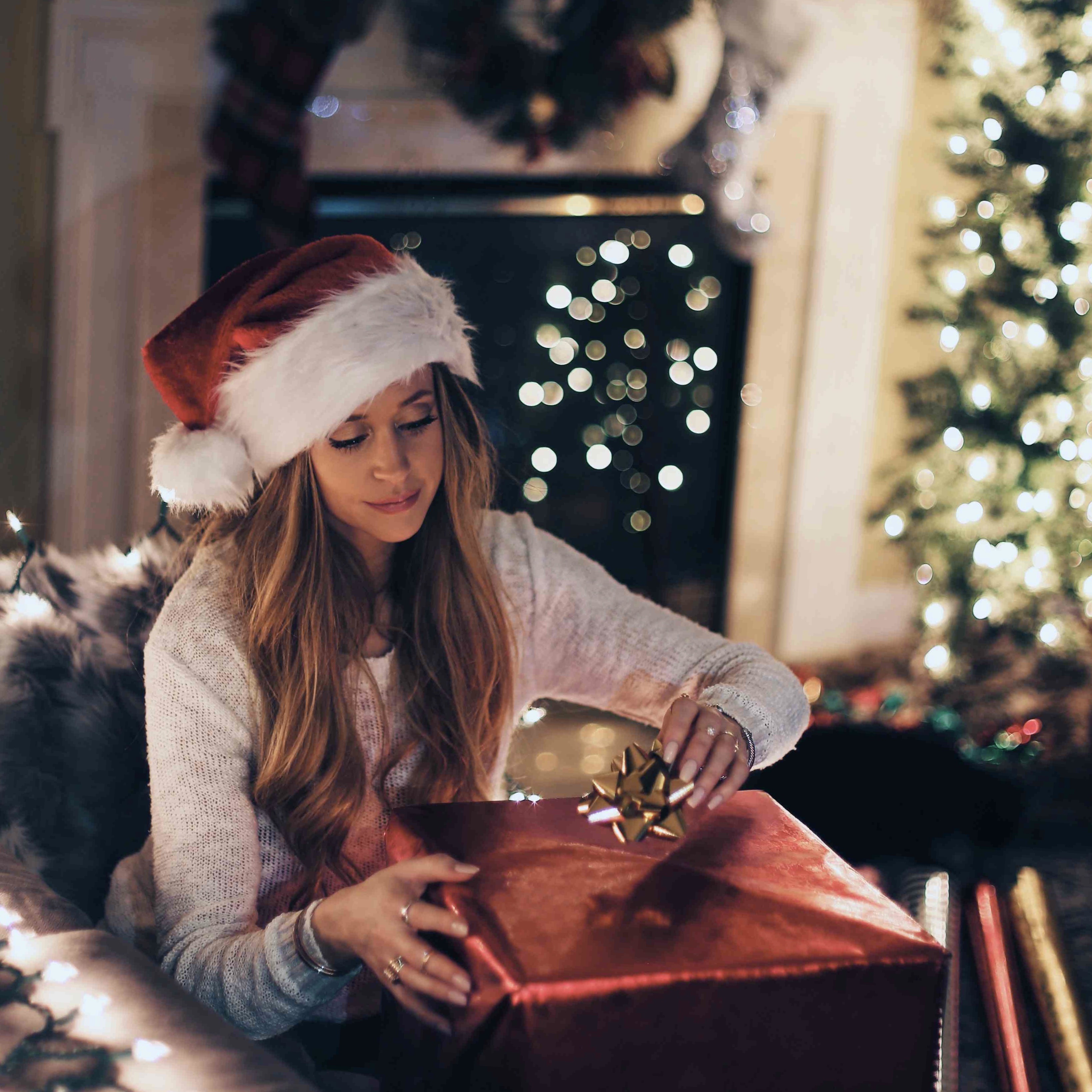 Woman wrapping christmas present